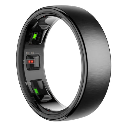 Close-up of a sleek black smart ring with internal health sensors and indicators.