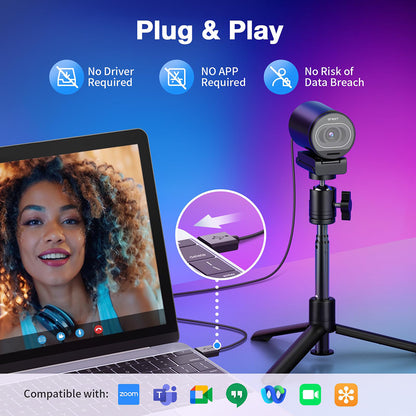 Plug and play webcam on a tripod connected to a laptop showing a video call.